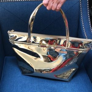 Kate Spade gold hand bag brand new without tags
